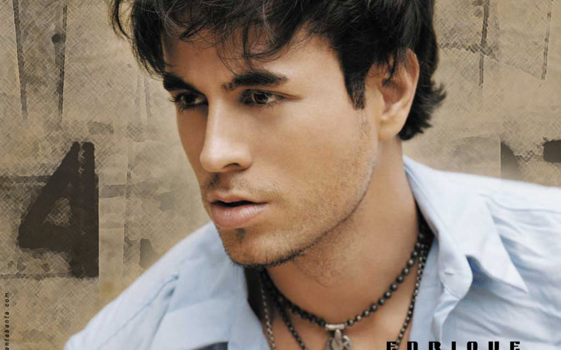 Enrique Iglesias with Fringe and Layered Hairstyle  French Fashions