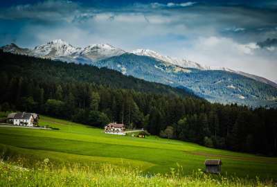 Beautiful Nature Landscape With Houses and Mountains