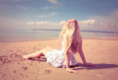 Blonde Girl On Beach