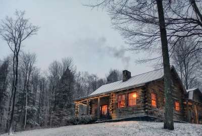 Cabin on a Snowy Evening