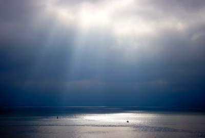 Light Trough Clouds Over Sea