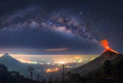 Milky Way Coming Out of an Erupting Volcano