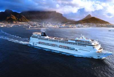 MSC Sinfonia Ship White Passenger on the Go Sea Day City Sky Mountains