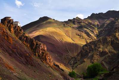 Painted Hills and a Boulder-Mounted Monastery in Ladakh Region India