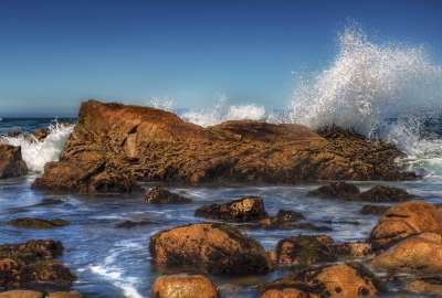 Waves Splash on Beach Rocks