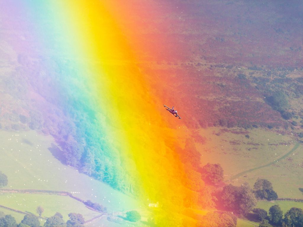 A Royal Air Force GR Tornado Soars Through a Rainbow in the Cambrian Mountains Wales wallpaper