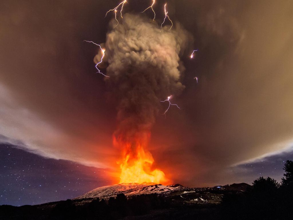 A Thunderstorm With Volcanic Lightning Seen as Mount Etna Erupts wallpaper