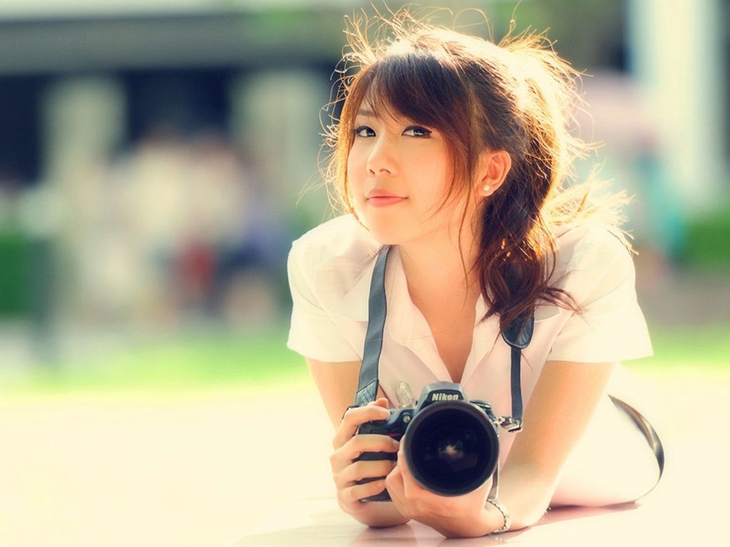Asian Girl With A Camera wallpaper