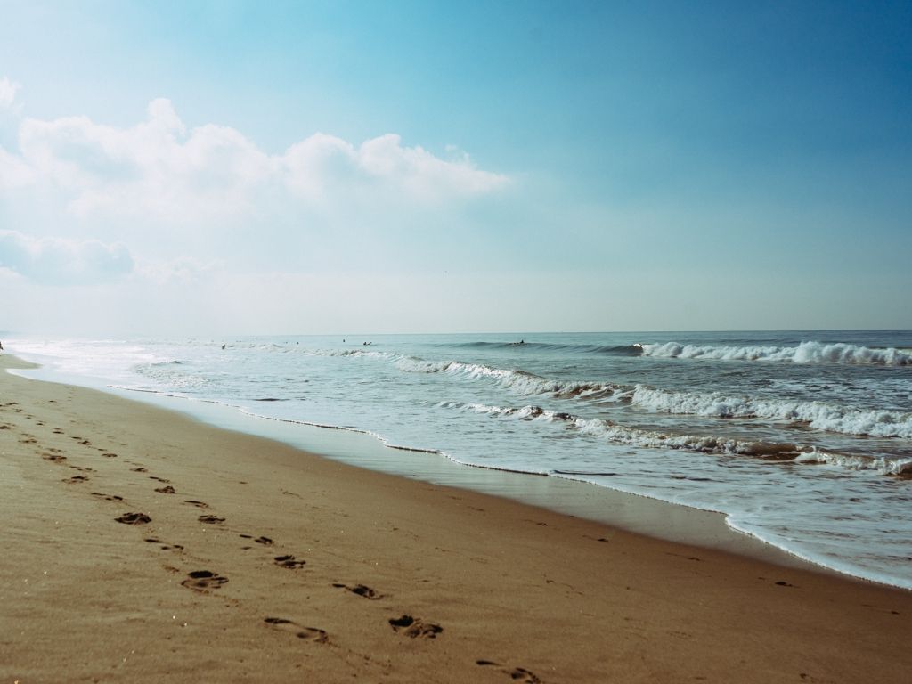 Beach Blue Brown Footprints Orange Sand Sea Shore Water Waves wallpaper