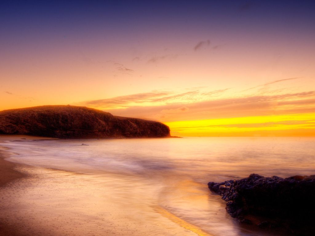 Beautiful Golden Sunset Over the Ocean wallpaper