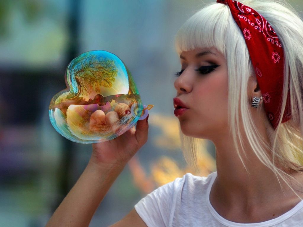 Blonde Blowing Soap Bubble wallpaper
