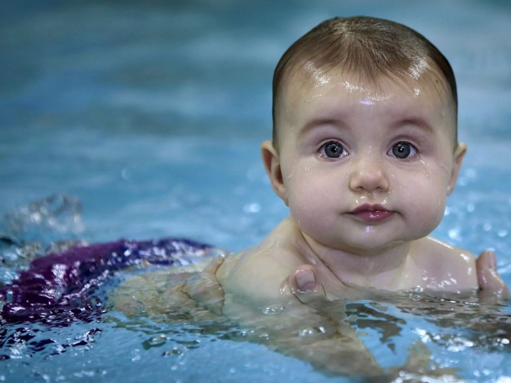 Cute Baby in Water wallpaper