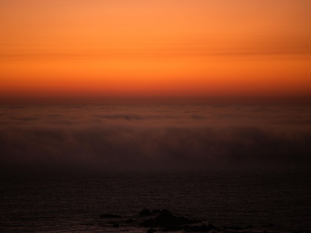 Fog Coming in at Sunset wallpaper