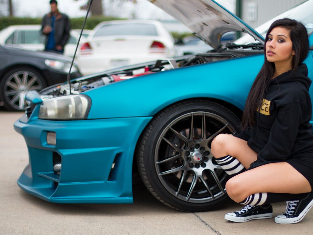 Girl Next to Blue Modified Car wallpaper