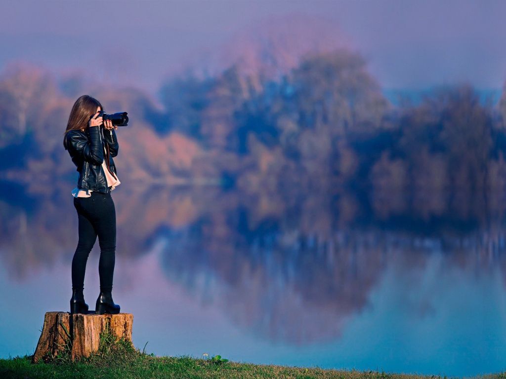 Girl Taking Pictures wallpaper