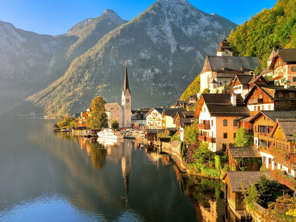 Houses Next to Lake and Mountains wallpaper