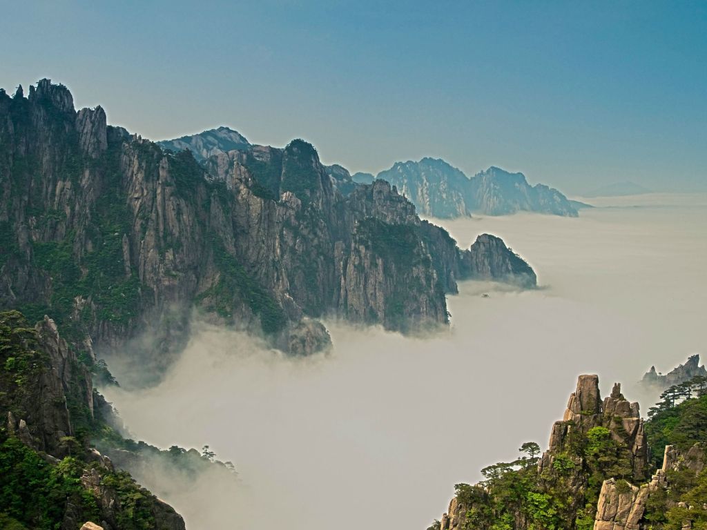 Mount Huangshan China Covered in Clouds wallpaper