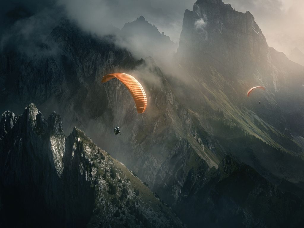 Parachute Diver Over Mountains wallpaper