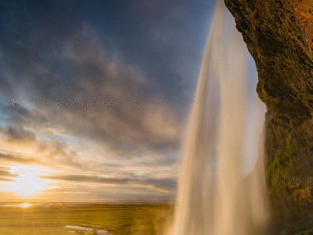 Seljalandsfoss Waterfall in Iceland During Sunset wallpaper