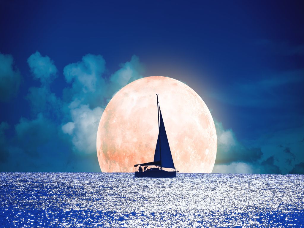 Silhouette of a Boat With Full Moon on the Ocean wallpaper