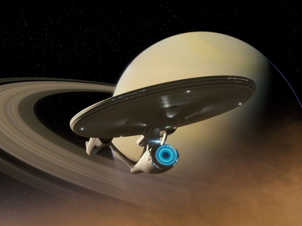 Starship Enterprise in Front of Saturn wallpaper