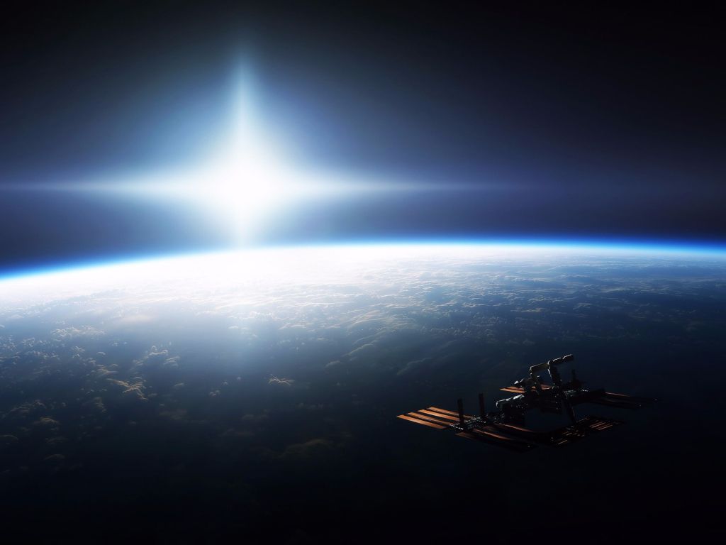 Sun Over Earth From Space wallpaper