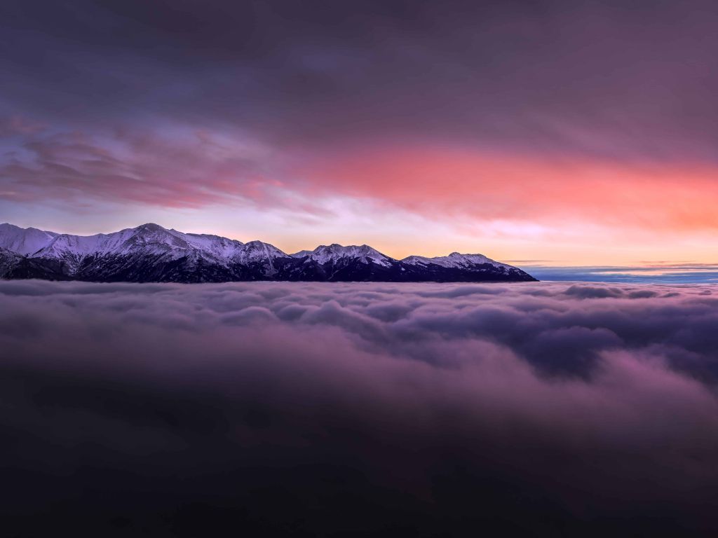 Sunset With Mountains Above Clouds wallpaper