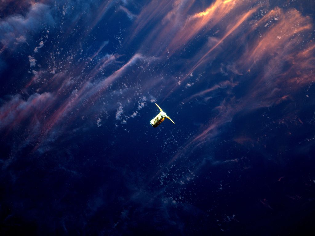 Supplies Arriving at ISS During Sunset wallpaper