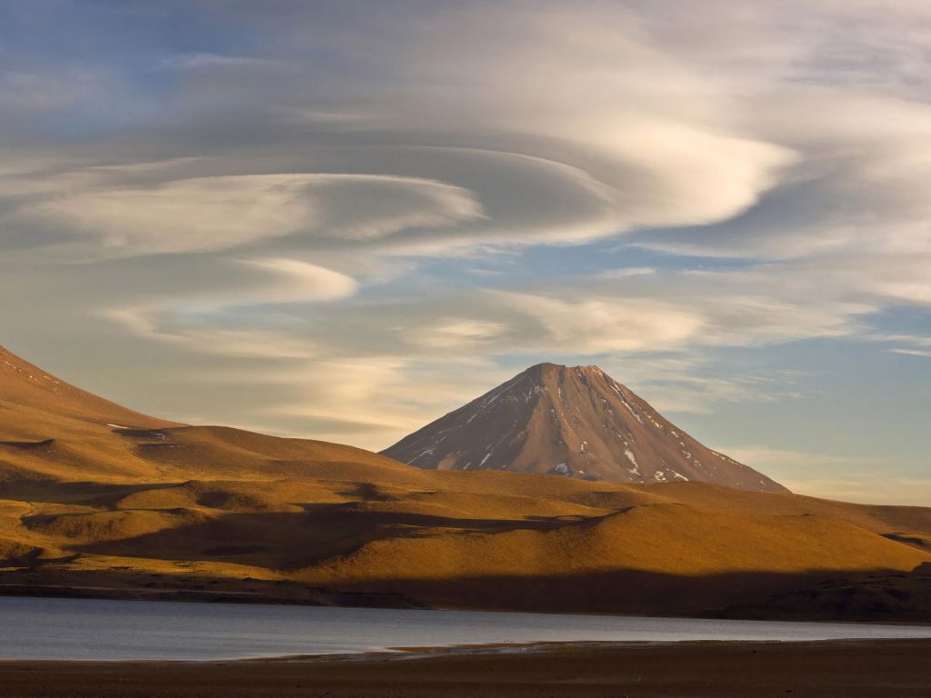 Swirling Clouds Over Volcano in Chile wallpaper