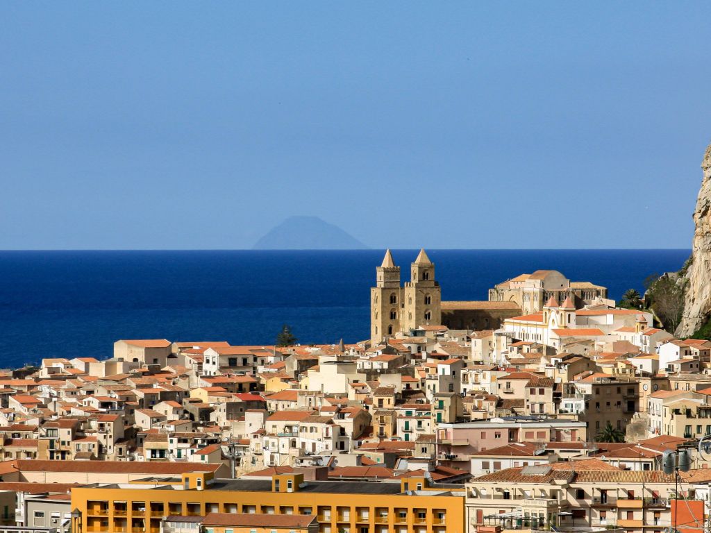 View of Cefalu With Isola Alicudi in the Distance Sicily wallpaper