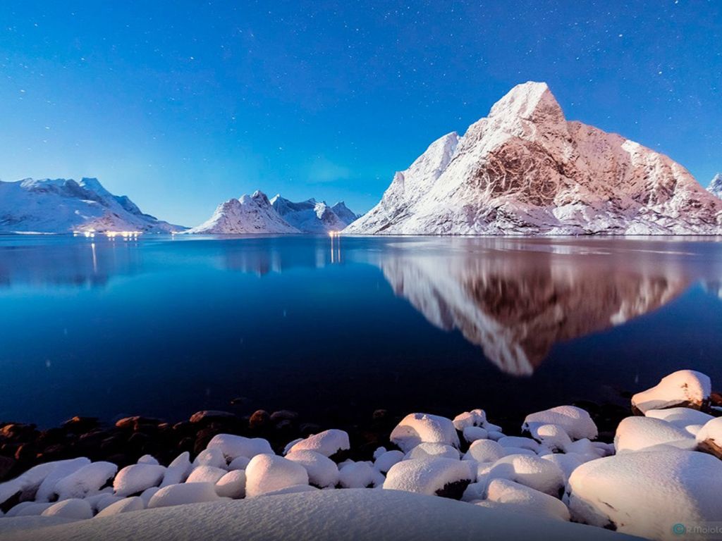 Winter Peaceful Lake Shore Stones Snow Mountains Blue Reflection in Water wallpaper