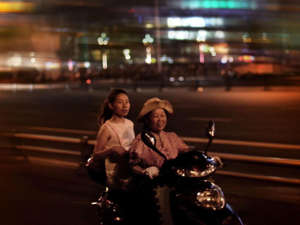 Women on Motorbikes in Chengdu China wallpaper